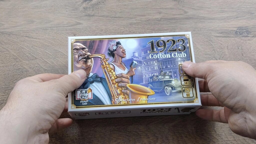Scatola del gioco fra le mani1923 Cotton Club